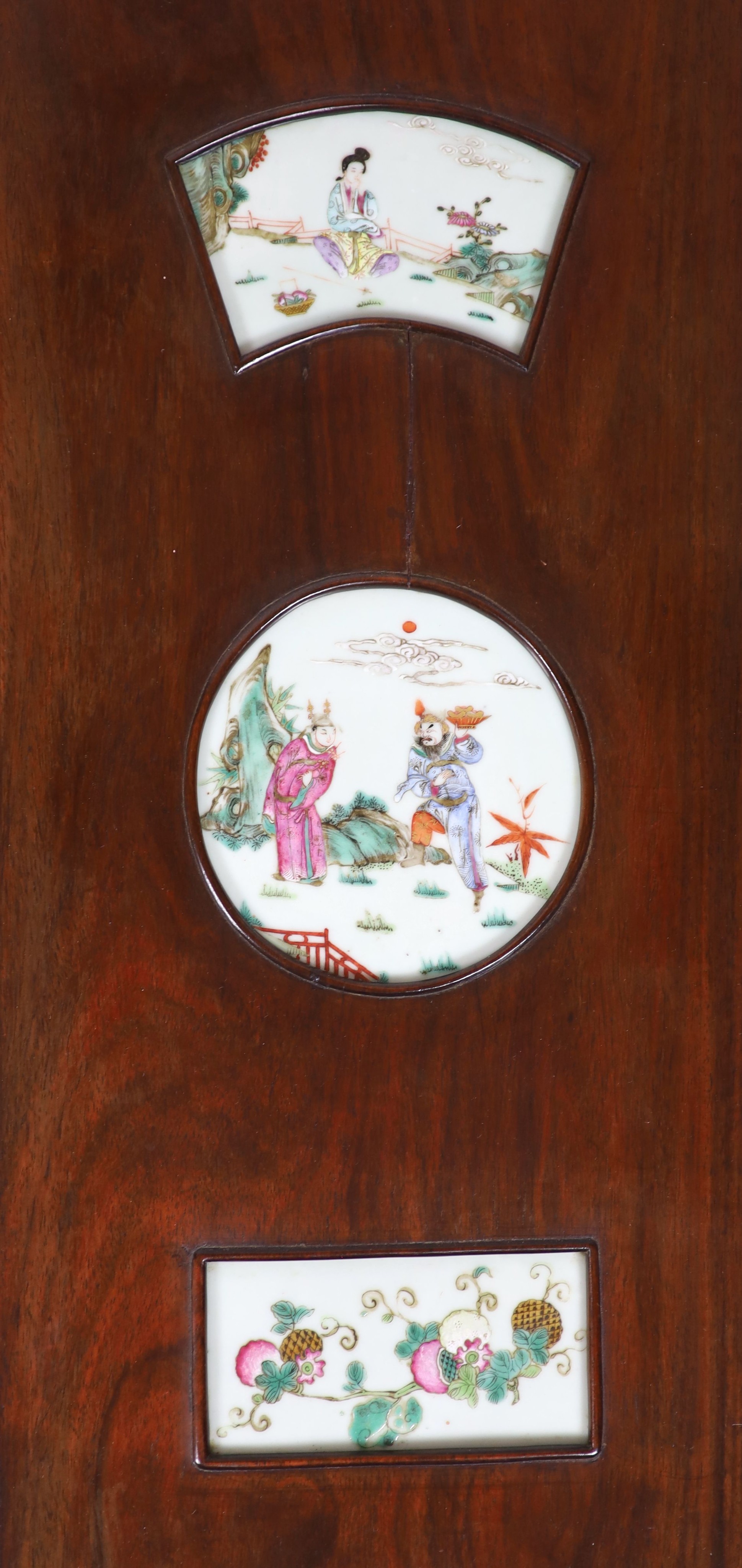 A Chinese porcelain mounted hardwood four fold screen, mid 19th century, Total size 127cm high x 122cm wide